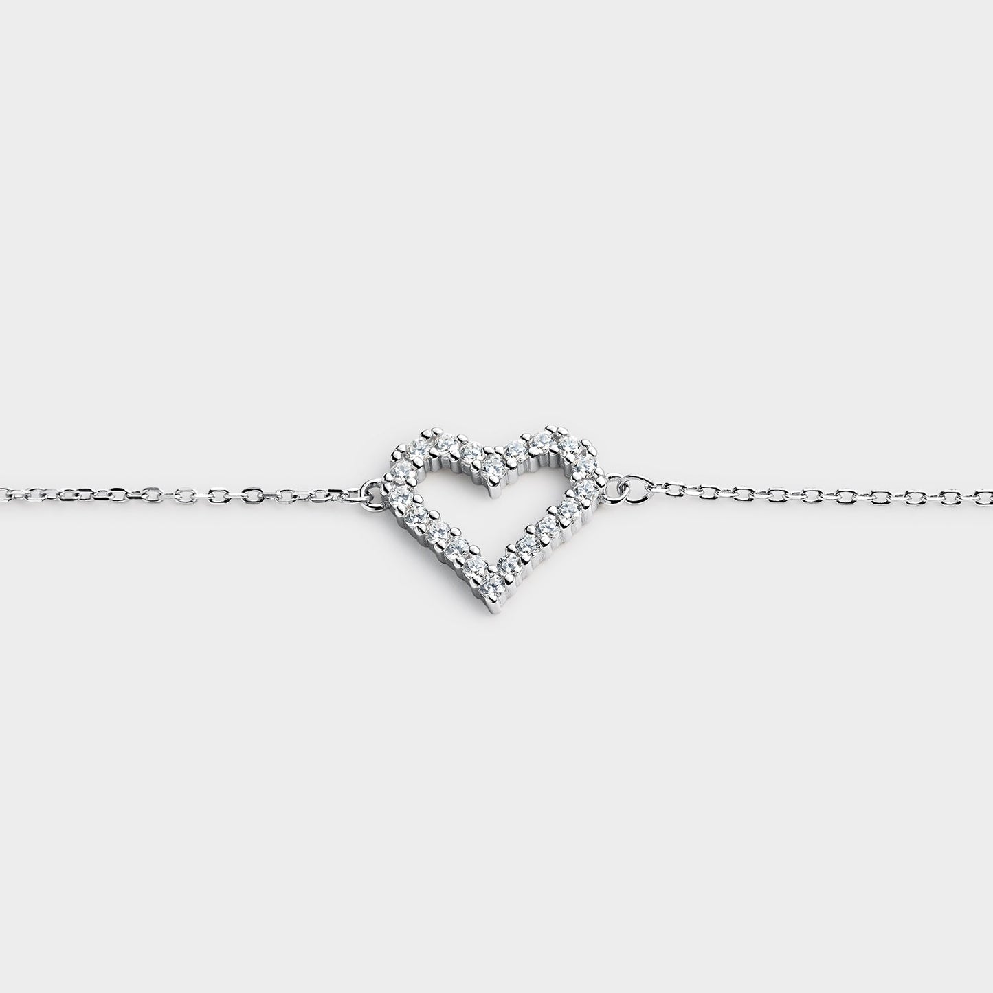 PULSERA CORAZÓN CENTRAL EN PLATA