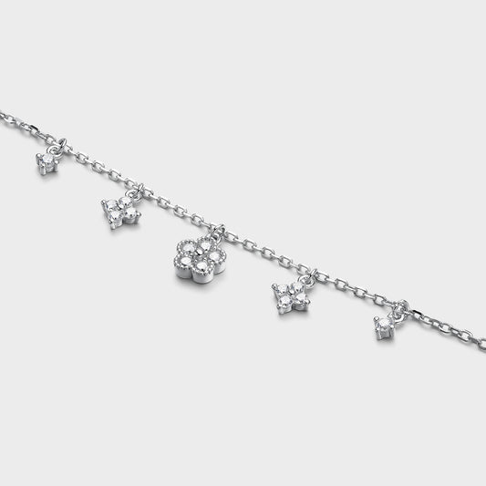 Pulsera de plata y flores colgantes con circonitas