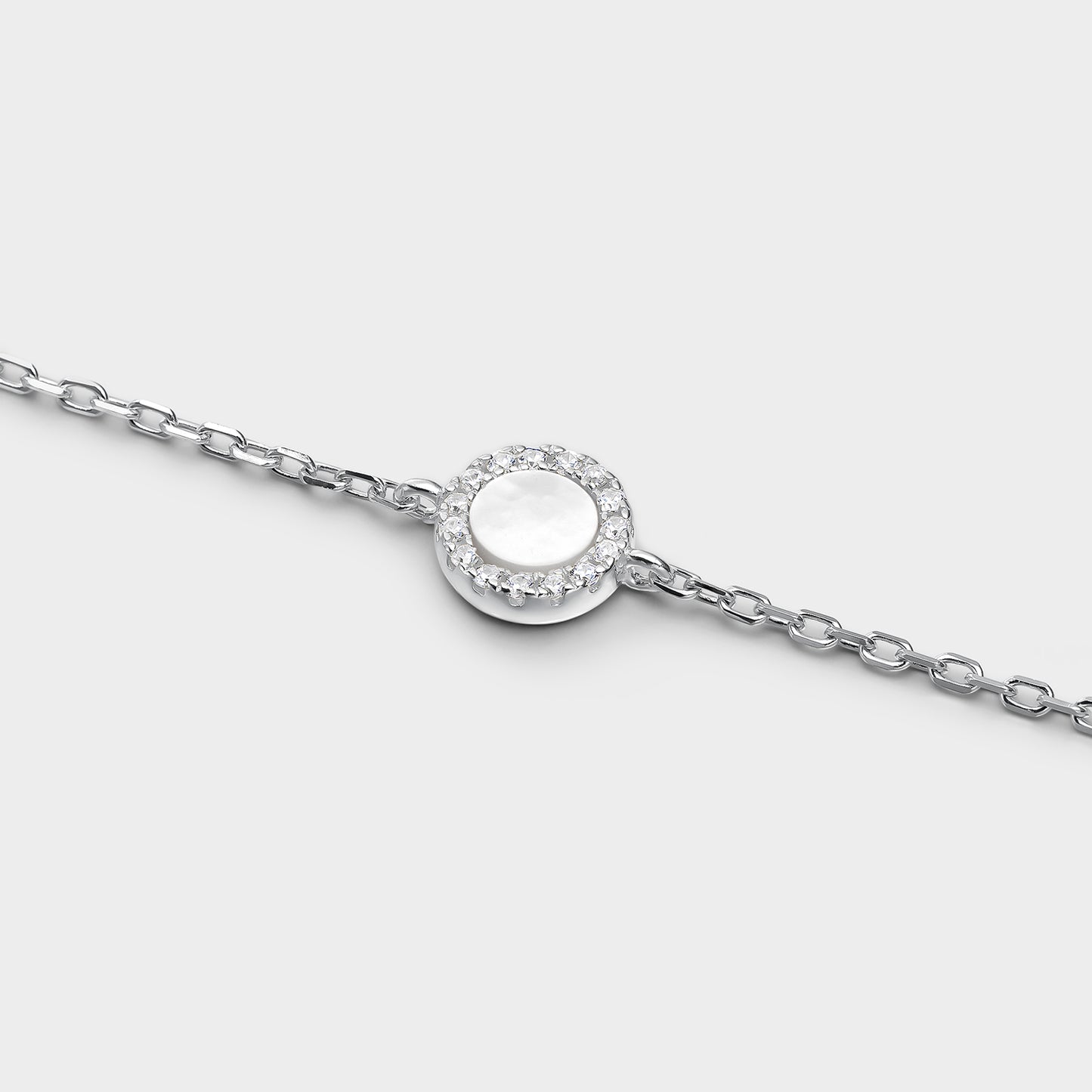 Pulsera círculo pequeño madre perla y circonitas blancas