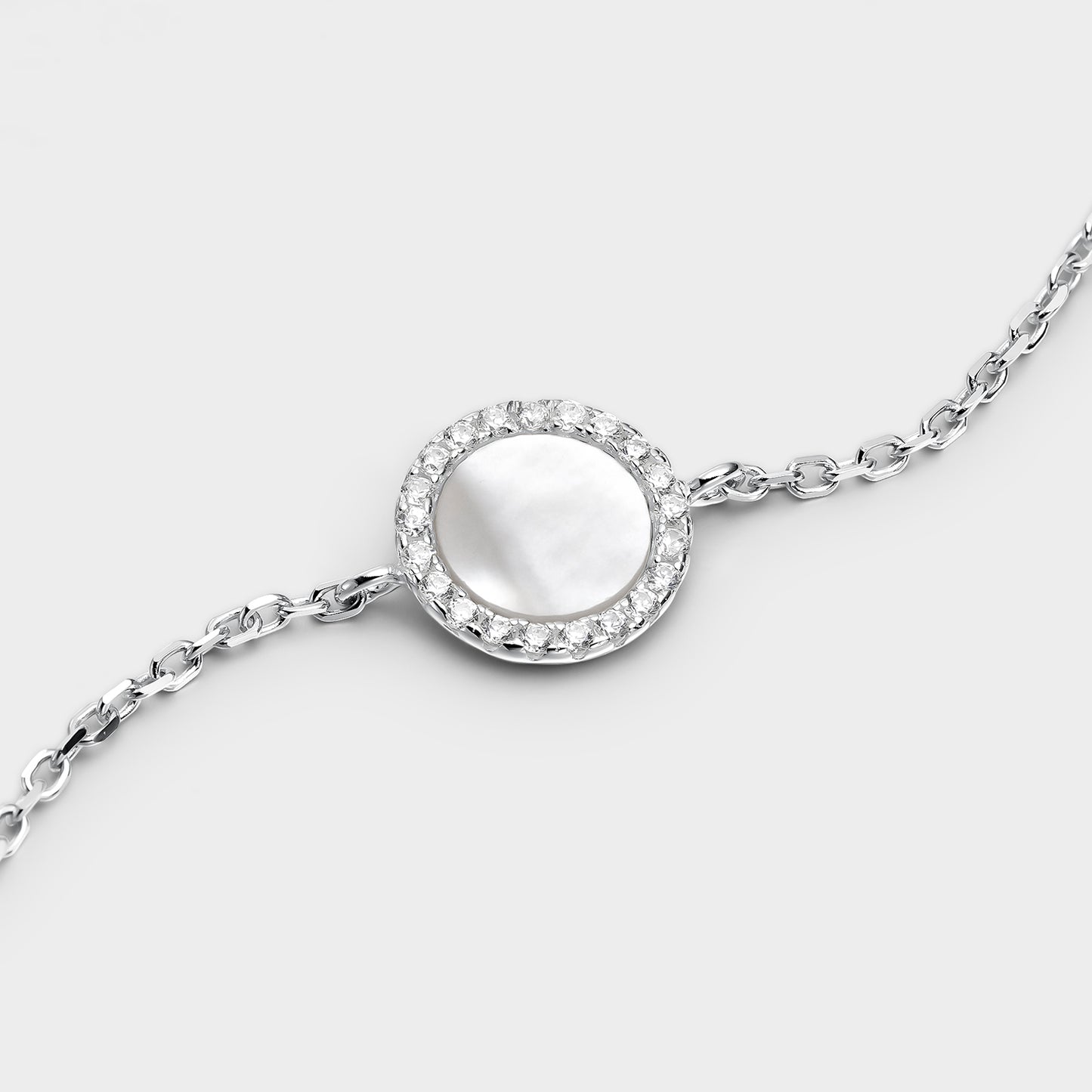 Pulsera círculo grande madre perla y circonitas blancas