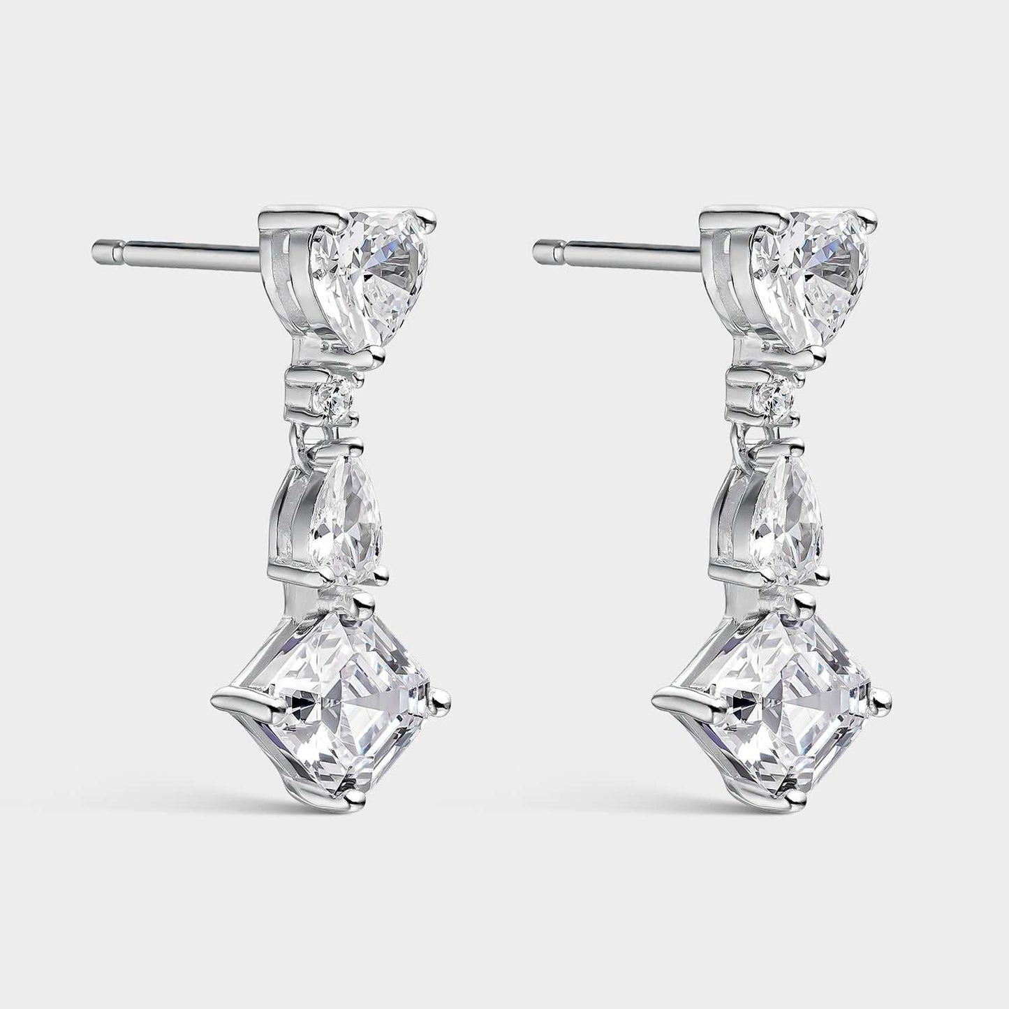 Pendientes asimétricos con circonitas blancas