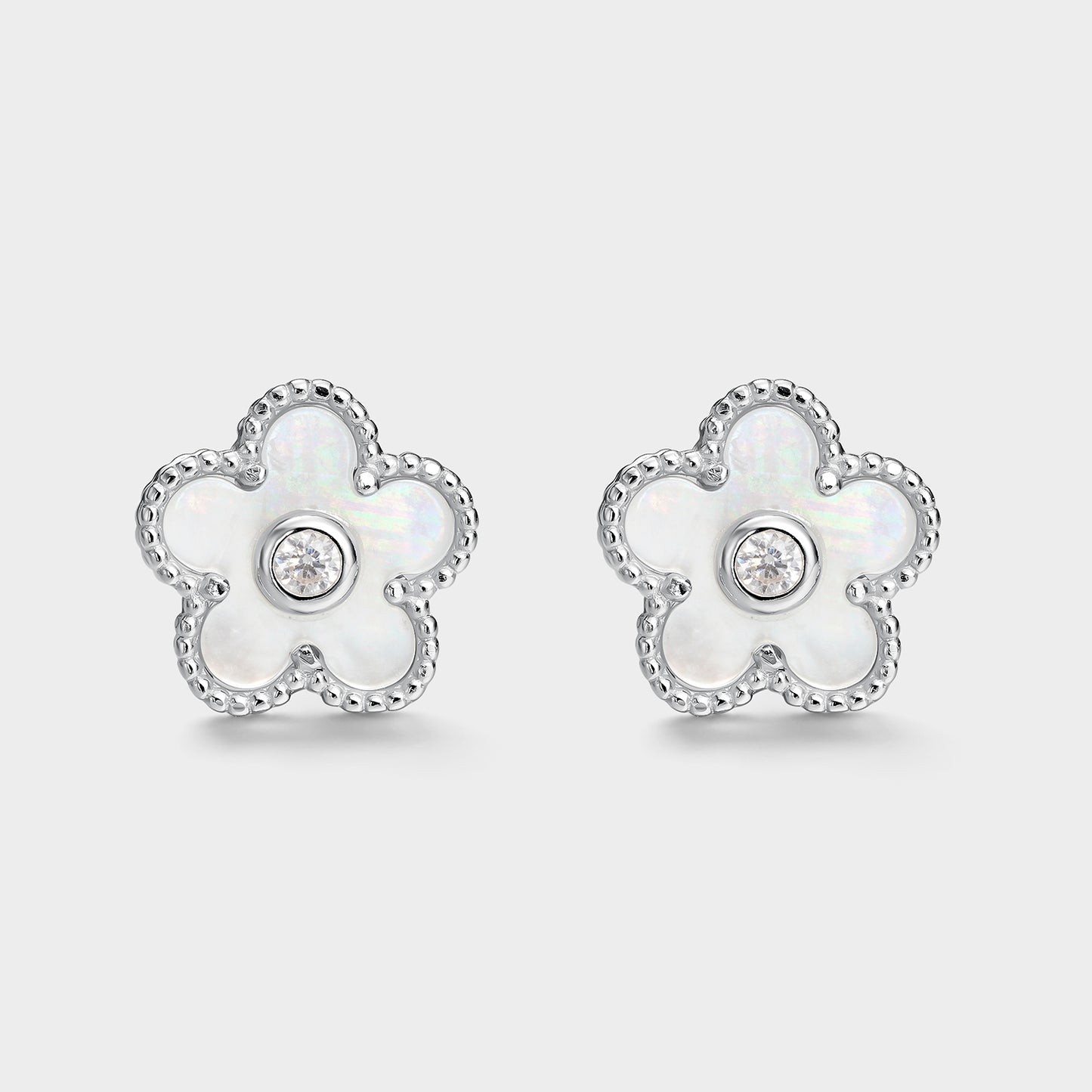 Pendientes flor de madre perla y circonita central