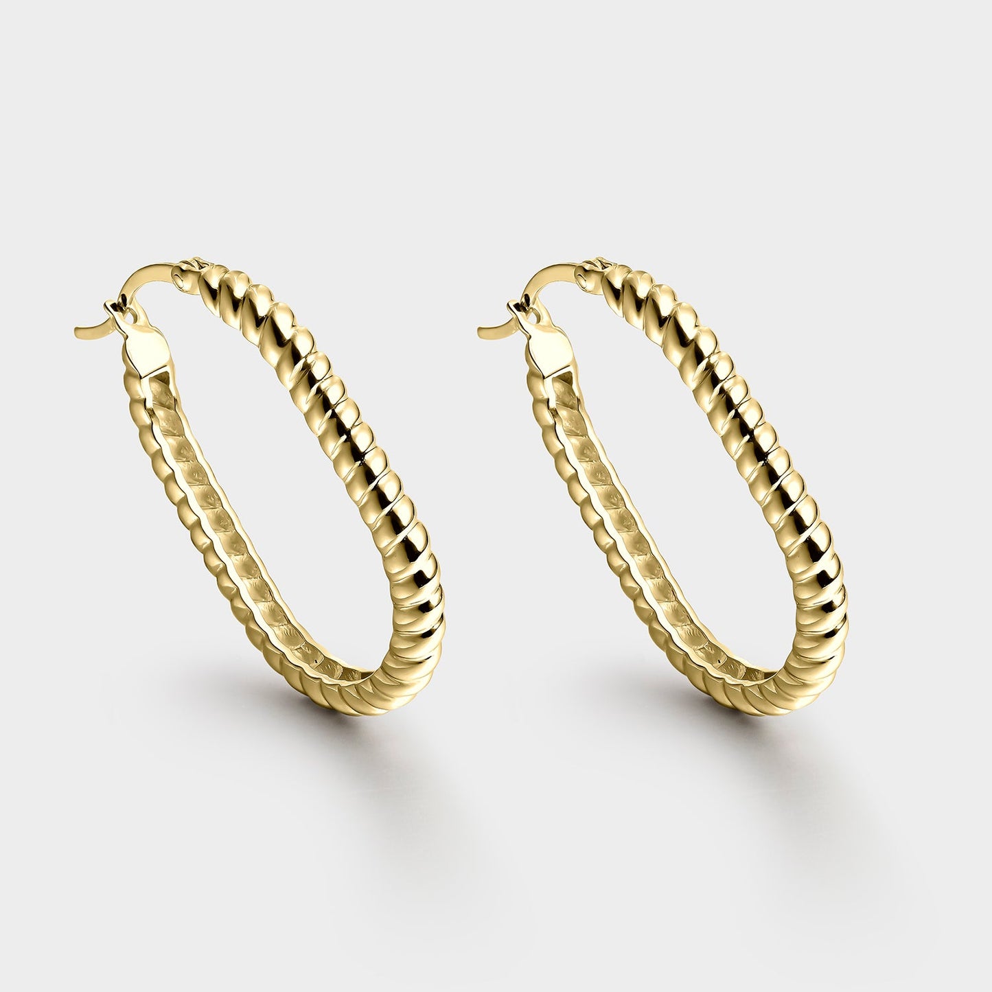Aros efecto soga plata bañada en oro 20x30mm