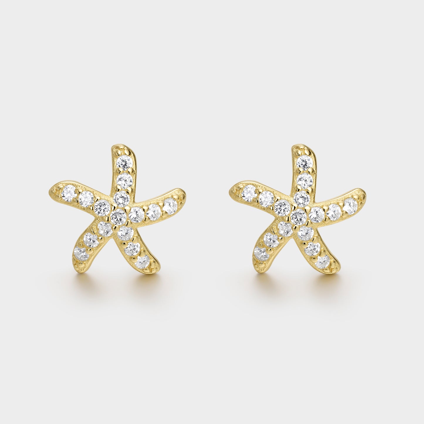 Pendientes de plata bañada en oro y circonitas estrella de mar