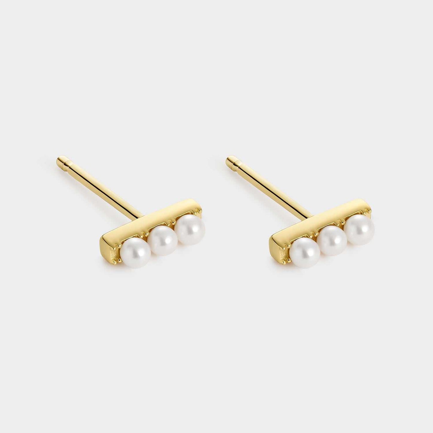Pendientes de plata y oro con perlas engastadas