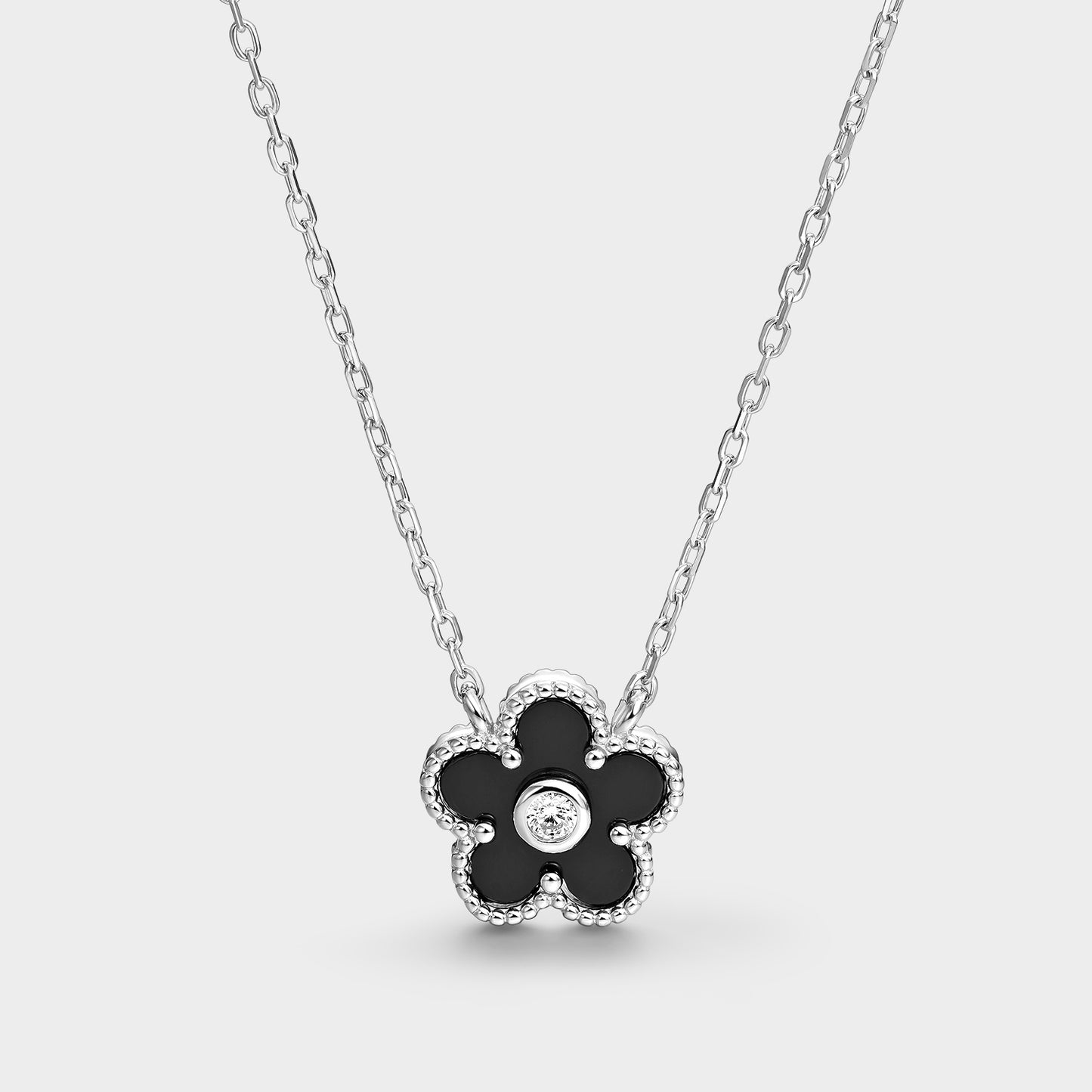 Collar flor de ónix y circonita central