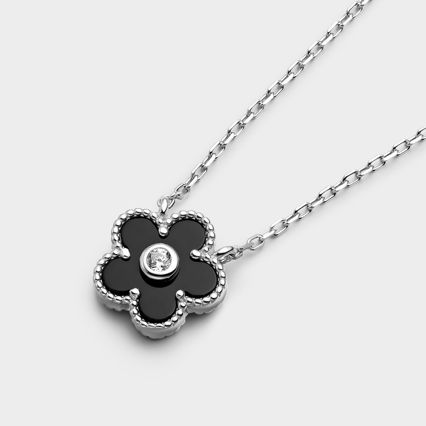 Collar flor de ónix y circonita central