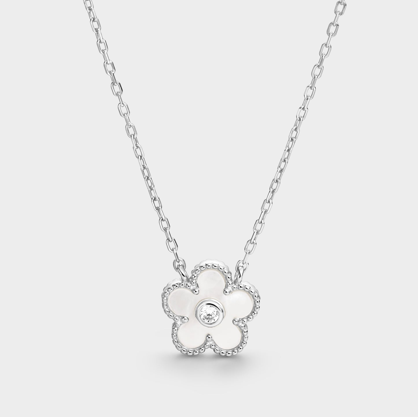 Collar flor de madre perla y circonita central