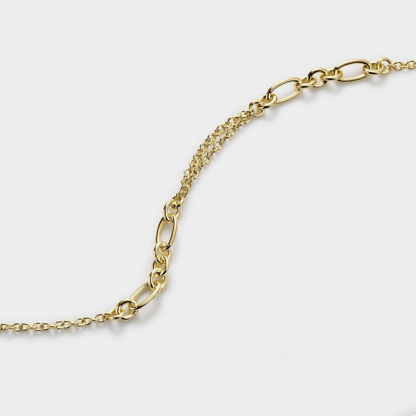 Pulsera con eslabones tipo nudo y efecto cadena doble
