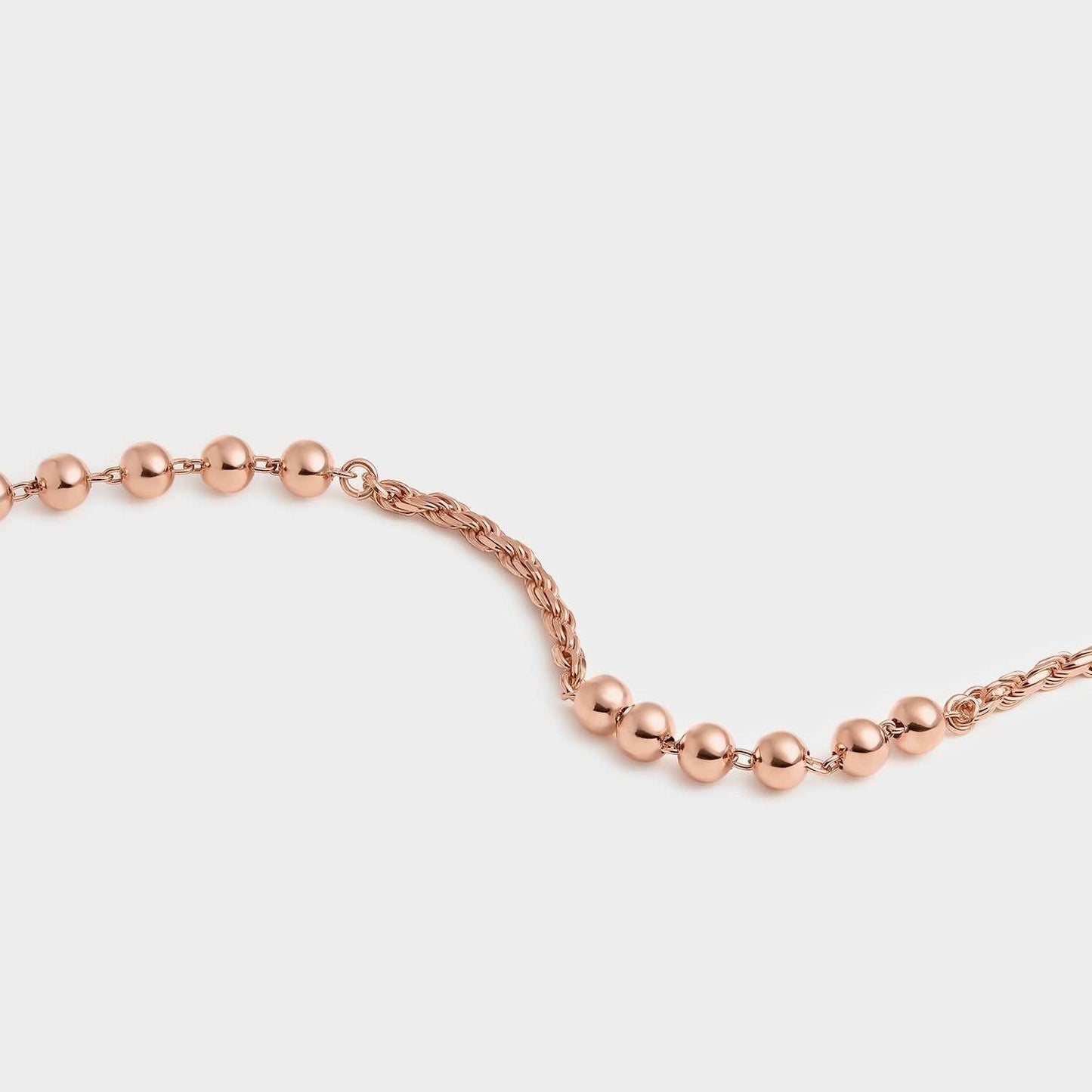 Pulsera oro rosa cadena y bolitas