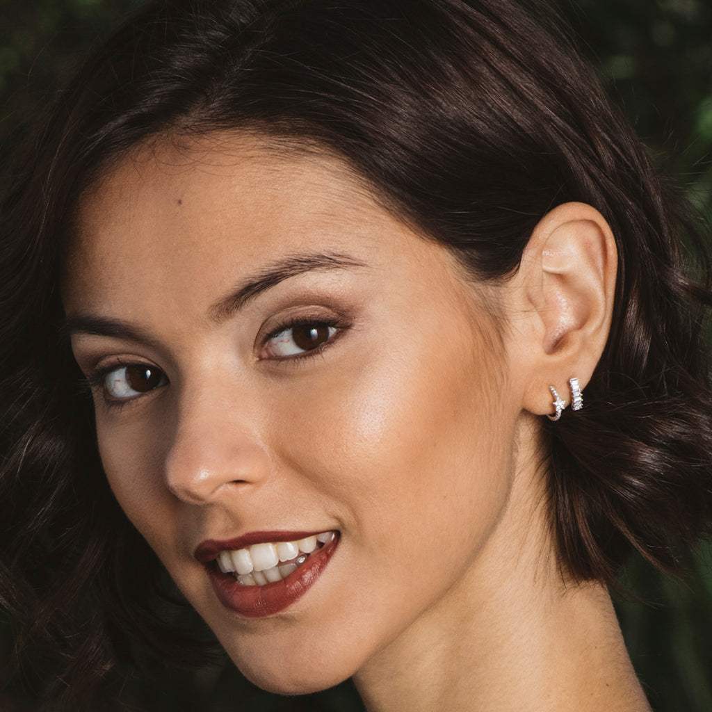 Silver and zircon earrings with star