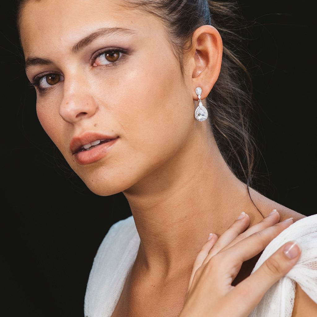 Silver water drop earrings with white zircons