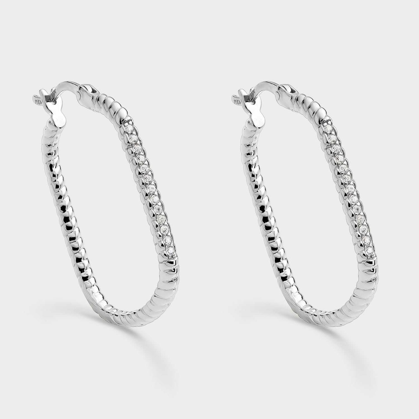 Pendientes criollas forma rectangular y circonitas blancas
