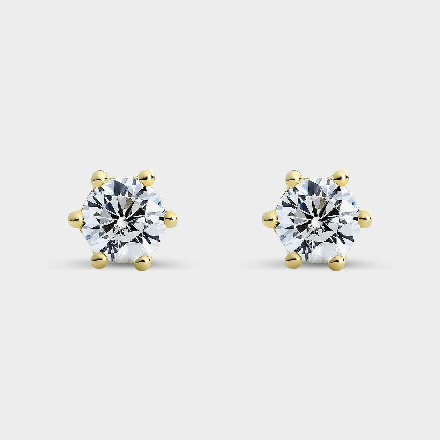 Pendientes de plata chapado en oro amarillo, montado sobre 6 garras con circonita de 3,8 mm