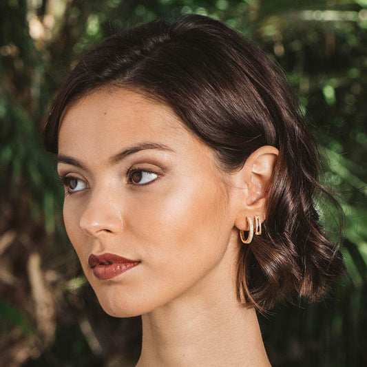 Creole earrings in gold-plated silver and two-lane zircons, medium size