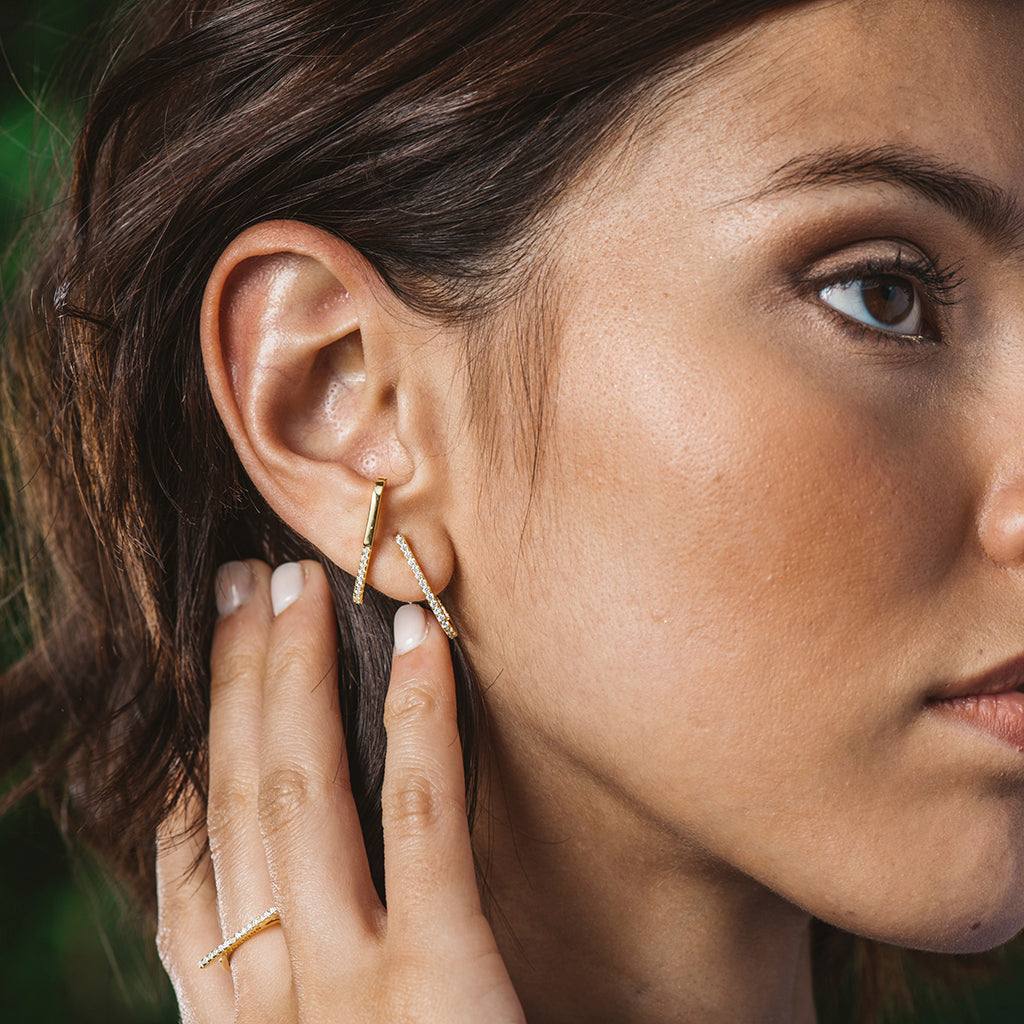 Climber-style silver and zircon earrings