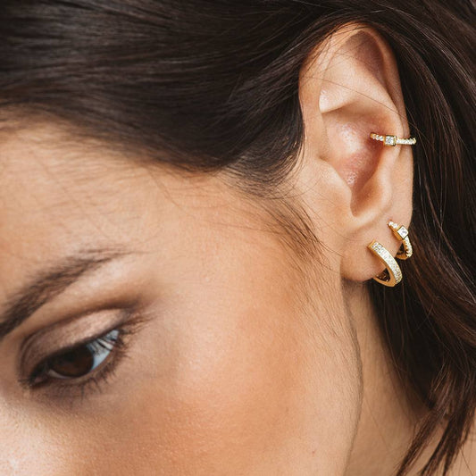 Creole earrings in gold-plated silver and zircons with square zirconia