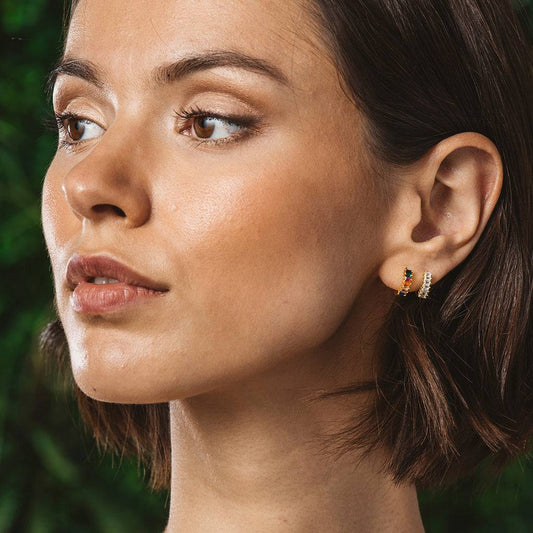 Creole silver and gold earrings with zircons