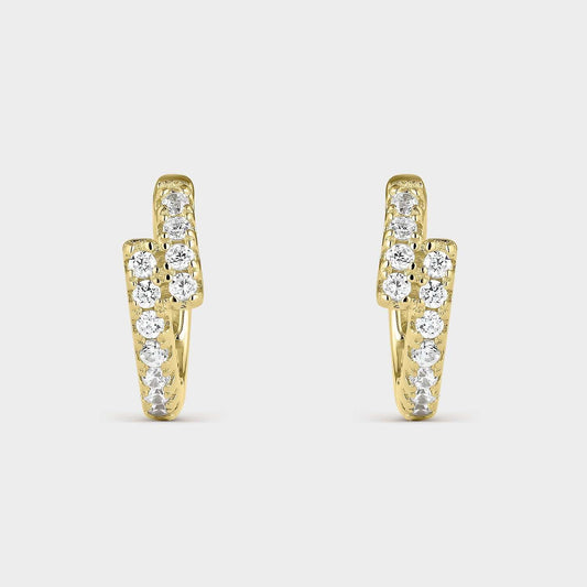 Pendientes criollas de plata  bañada en oro amarillo con dos carriles de circonitas blancas en zigzag.