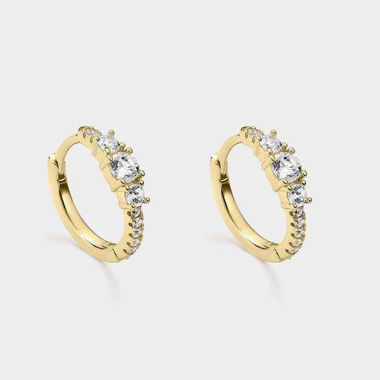 Kreolische Ohrringe aus gelbvergoldetem Silber mit weißen Zirkonen in verschiedenen Größen