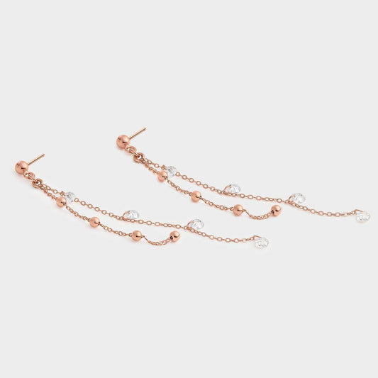 Pendientes dos cadenas oro rosa y cuentas de circonitas blancas