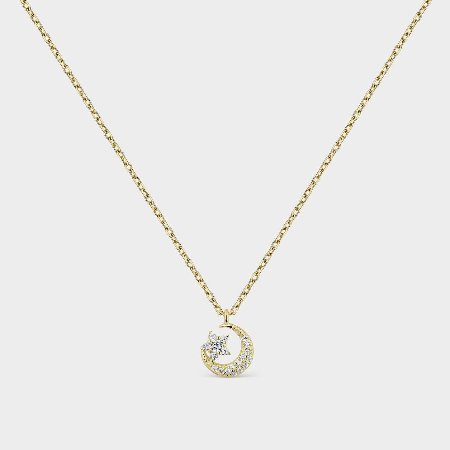 Collar baño oro con luna y estrella de circonitas blancas