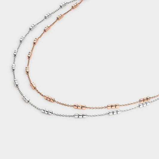 Collar doble bicolor con tríos de cubos