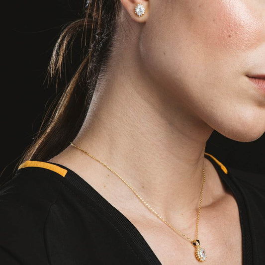 Conjunto en flor de collar y pendientes en plata bañada en oro con circonitas blancas