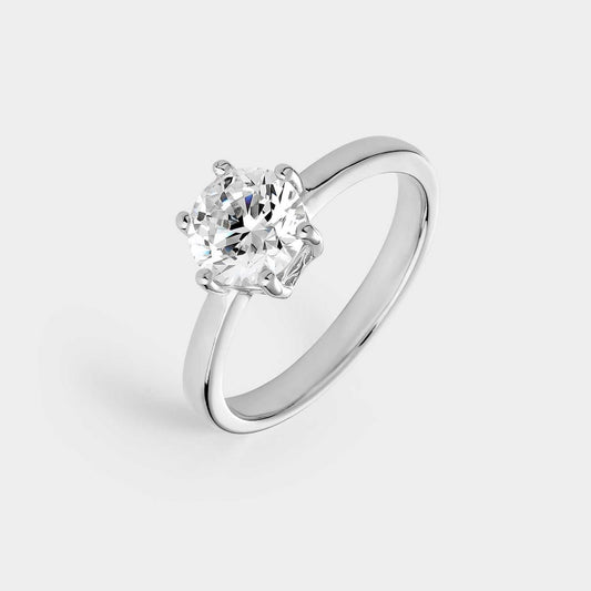 Silver solitaire ring with 7 mm zirconia mounted on 6 claws