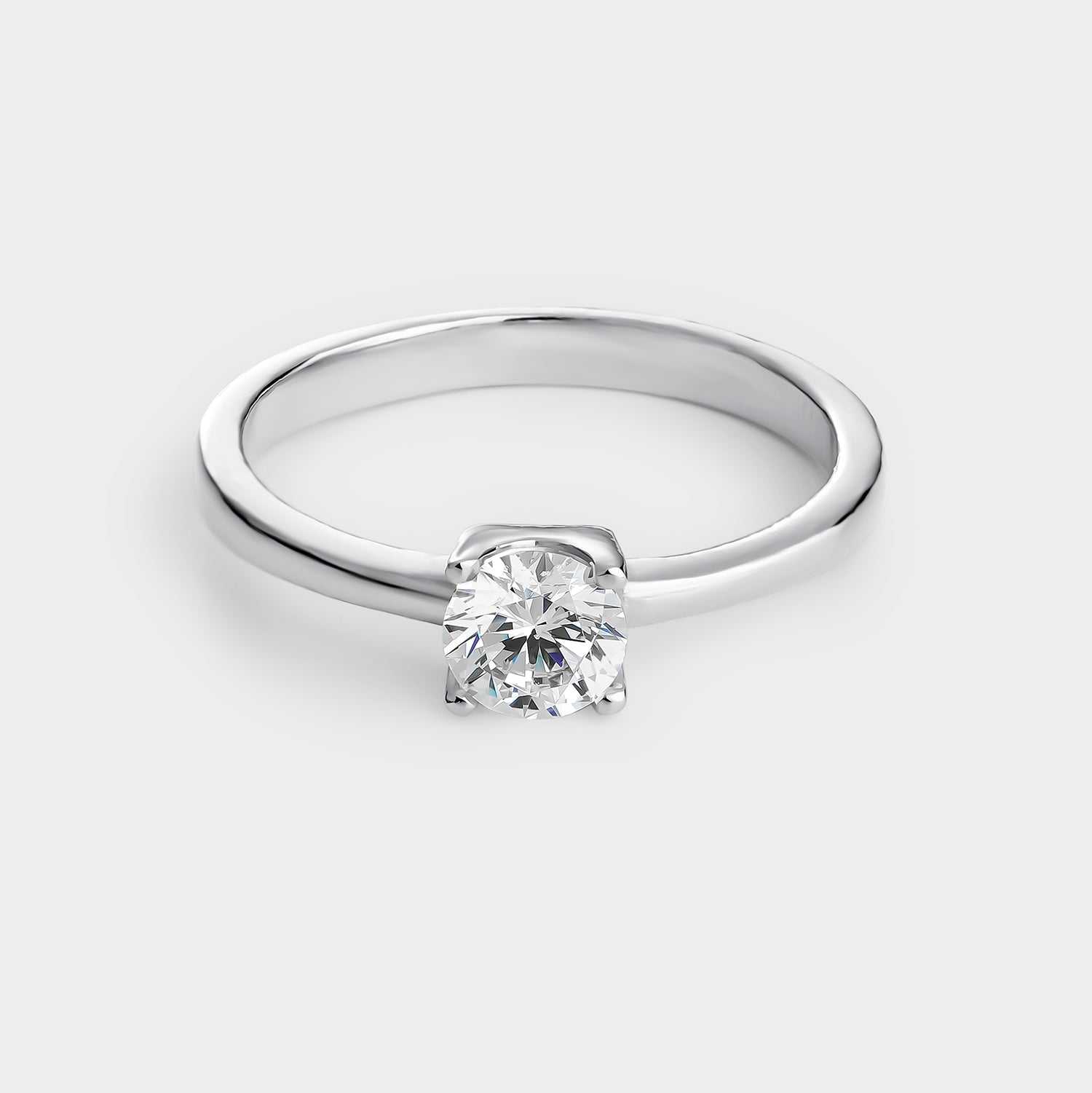 Anillo solitario plata con circonita de 5,25 mm montada sobre 4 garras