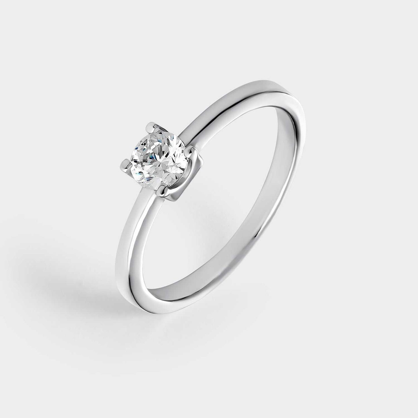 Silver solitaire ring with 4.5 mm zirconia mounted on 4 claws