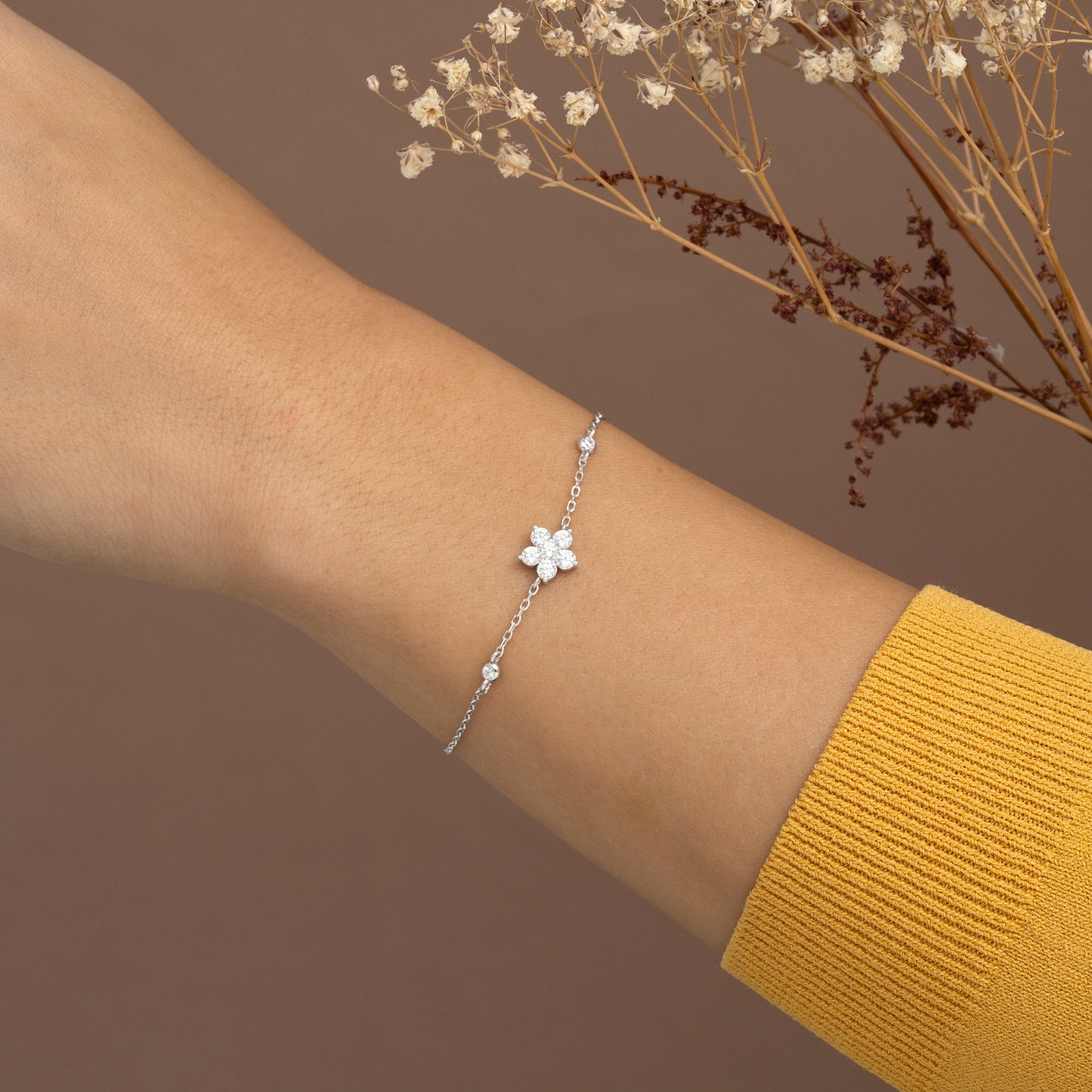 Pulsera de plata y circonitas abalorio de flor