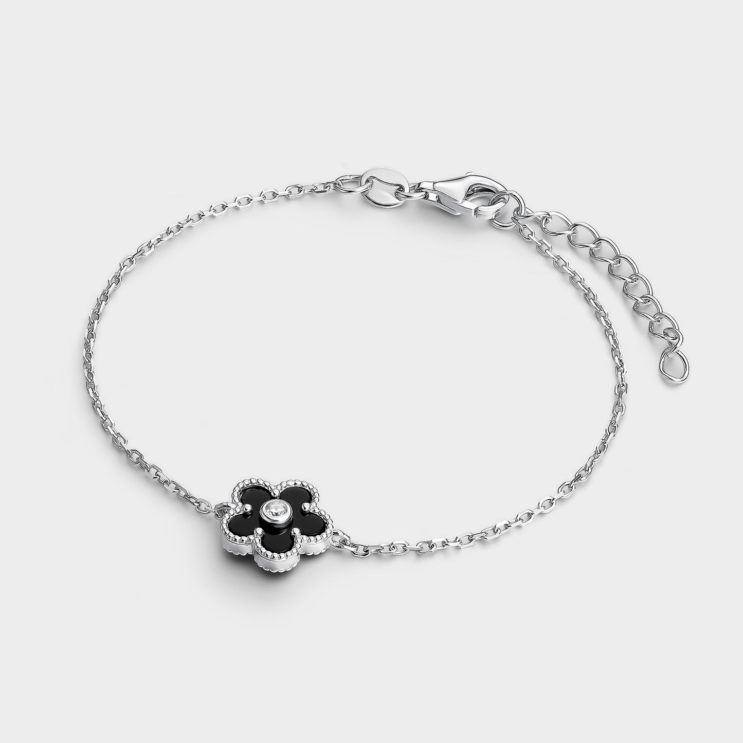 Pulsera flor de ónix y circonita central