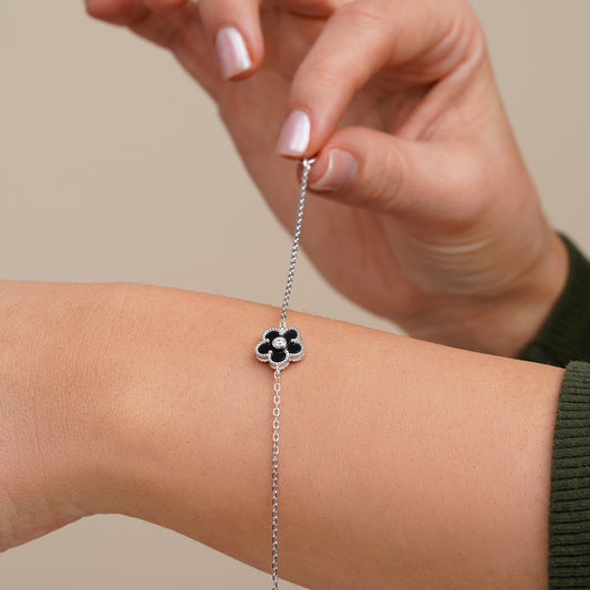 Pulsera flor de ónix y circonita central
