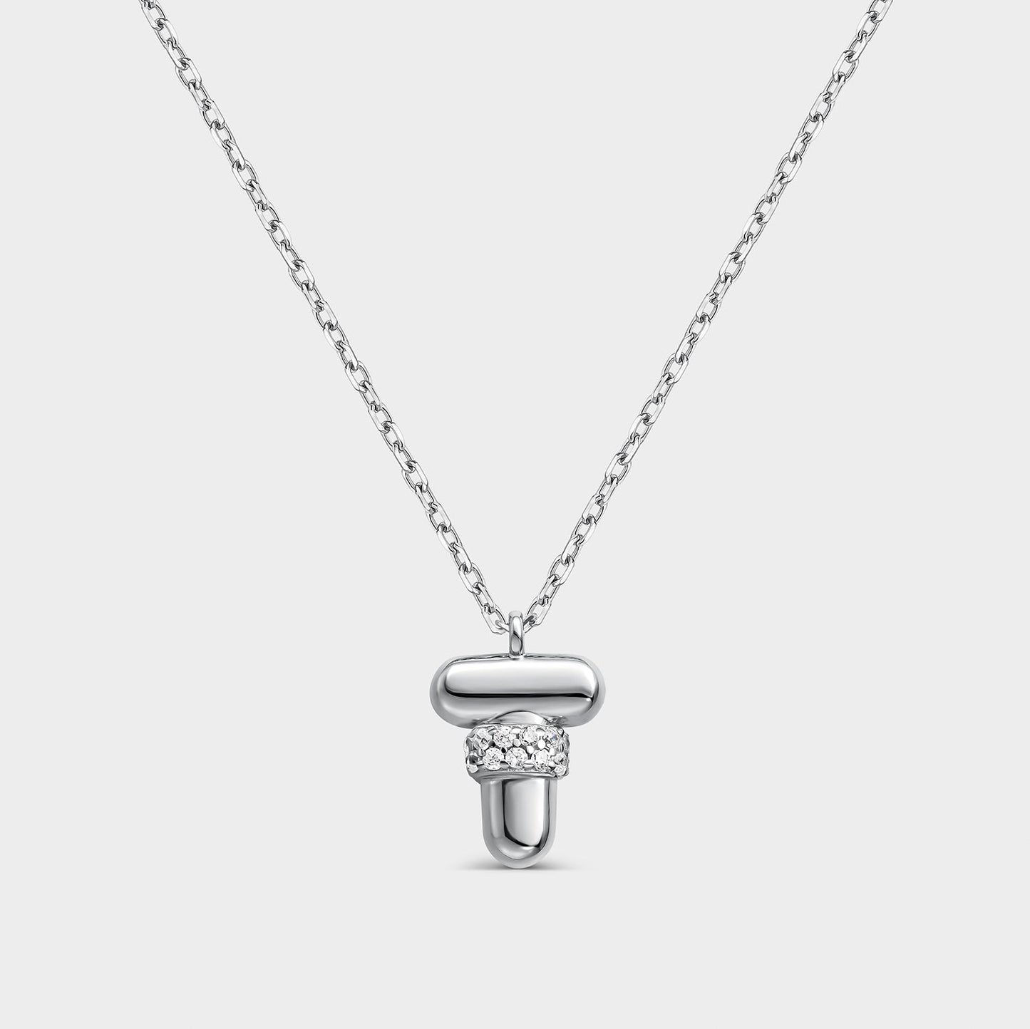 Collar con inicial "T" con volumen, plata y linea de circonitas