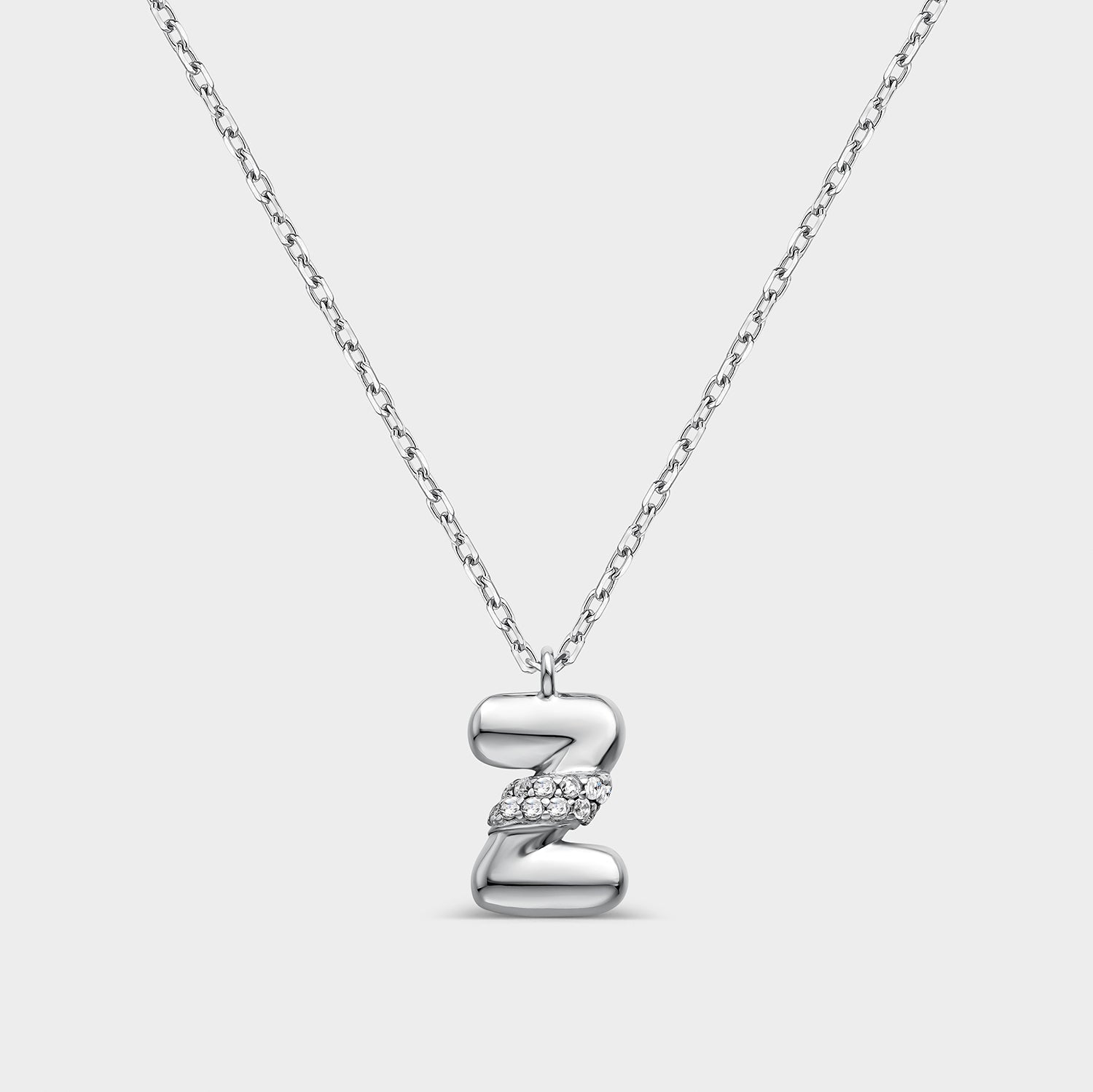 Collar con inicial "Z" con volumen, plata y linea de circonitas