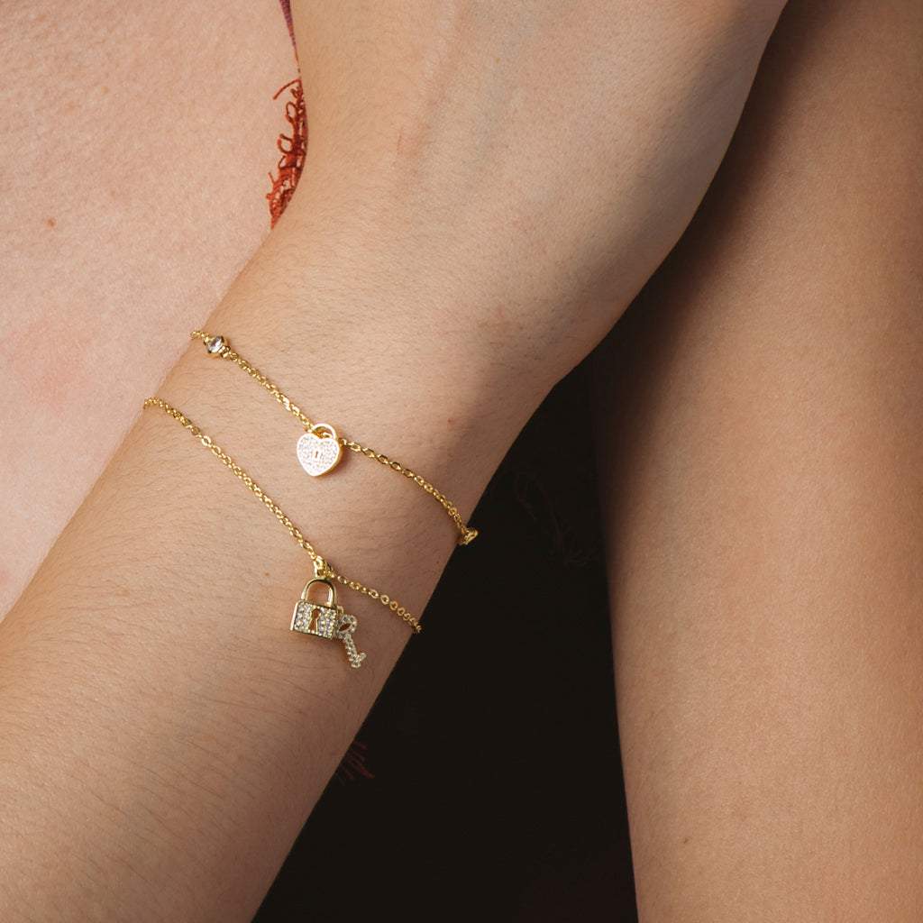 18 Karat vergoldetes Armband mit herzförmigem Vorhängeschloss
