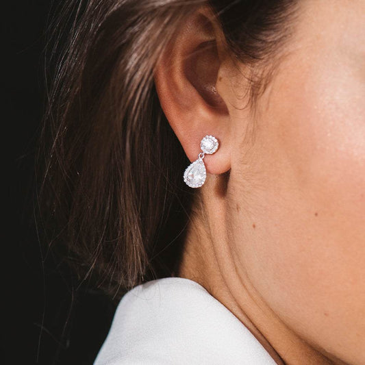 Silver teardrop earrings with white zircons