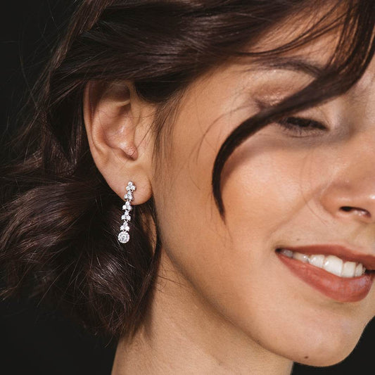 Silver earrings and white zircons