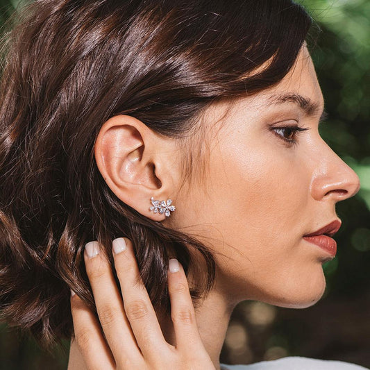 Silver flower earrings and white zircons