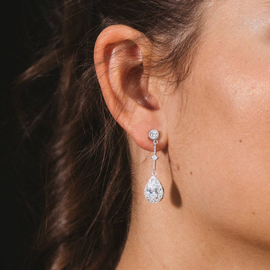 Oval silver earrings and white zircons