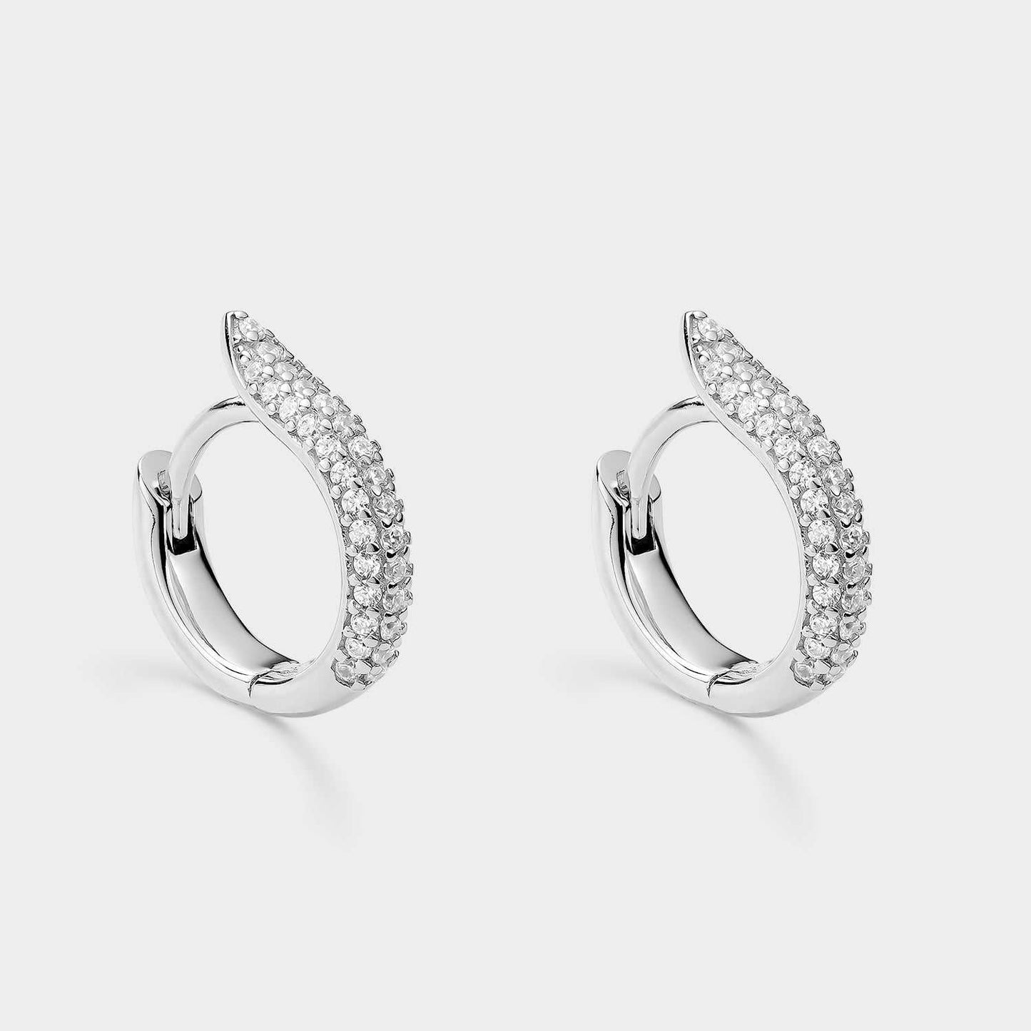 Creole silver earrings with hidden closure with white zircons