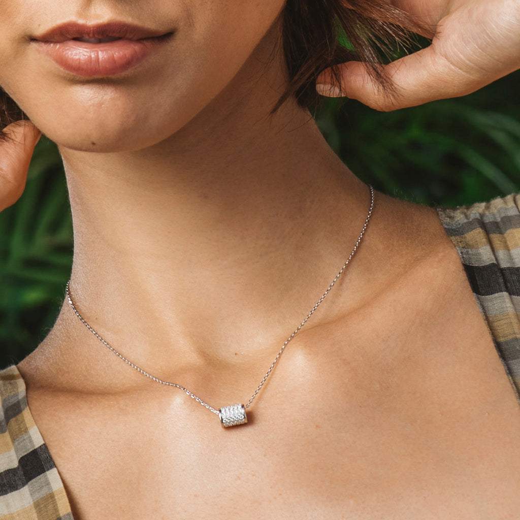 Silver and zircon cylinder pendant necklace