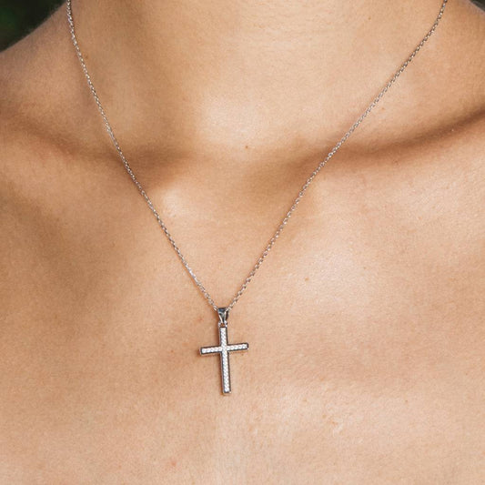 Silver and zircon necklace with beveled cross
