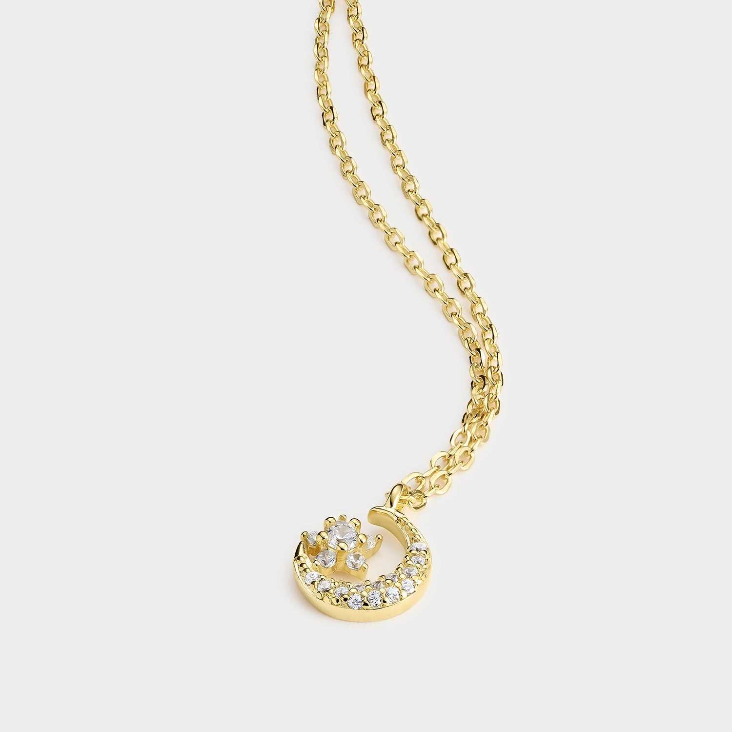 Collar baño oro con luna y estrella de circonitas blancas