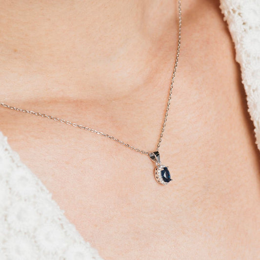 Conjunto oval de collar y pendientes en plata con circonitas blancas y azules