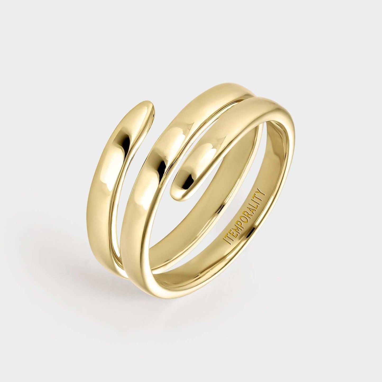 Anillo  de plata bañada en oro amarillo con forma de espiral