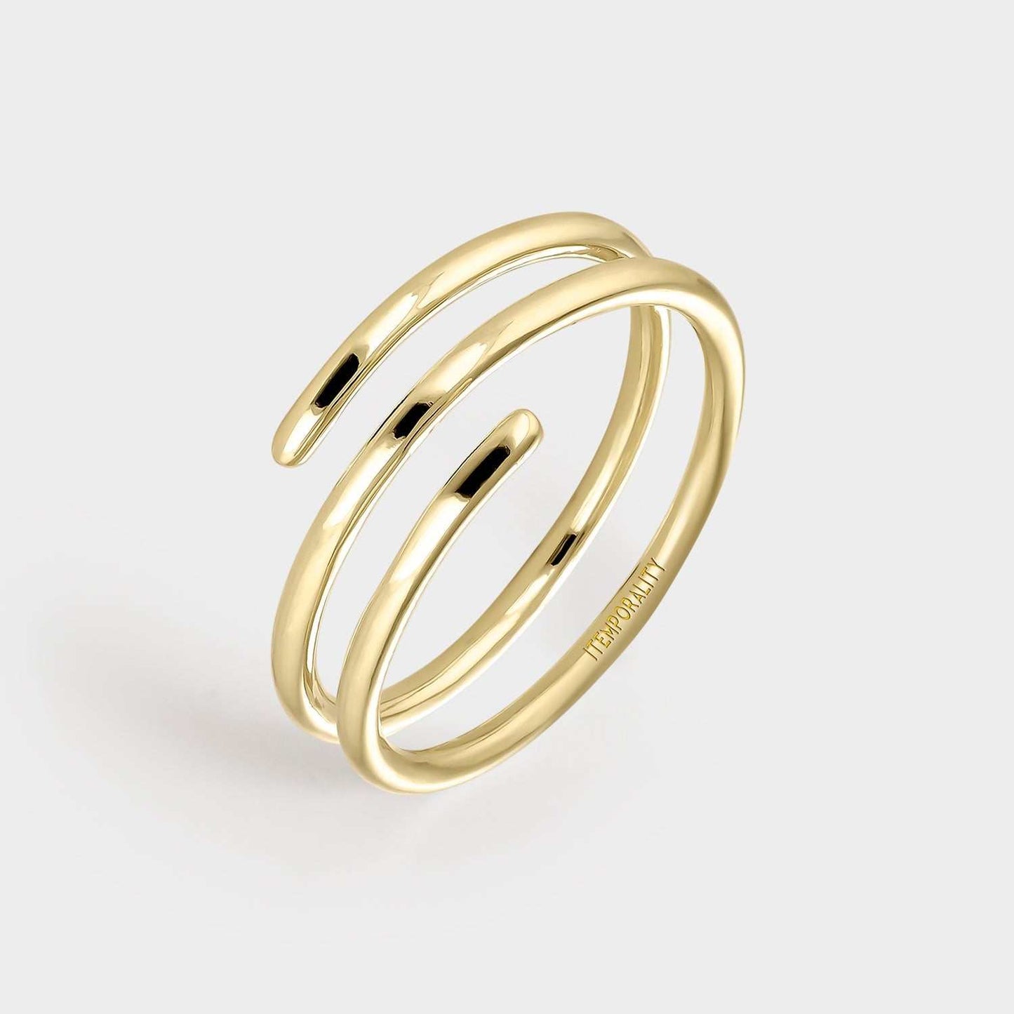 Anillo  de plata bañada en oro amarillo en forma de fina espiral