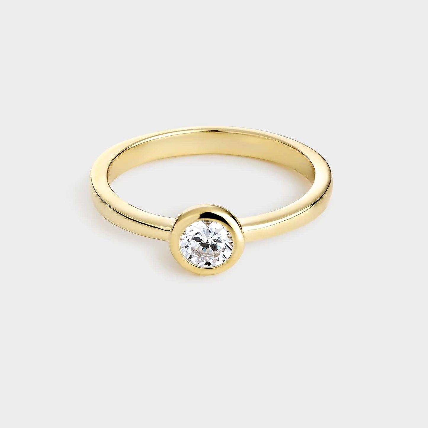 Yellow gold plated silver solitaire ring with 4.5mm zirconia set in bezel