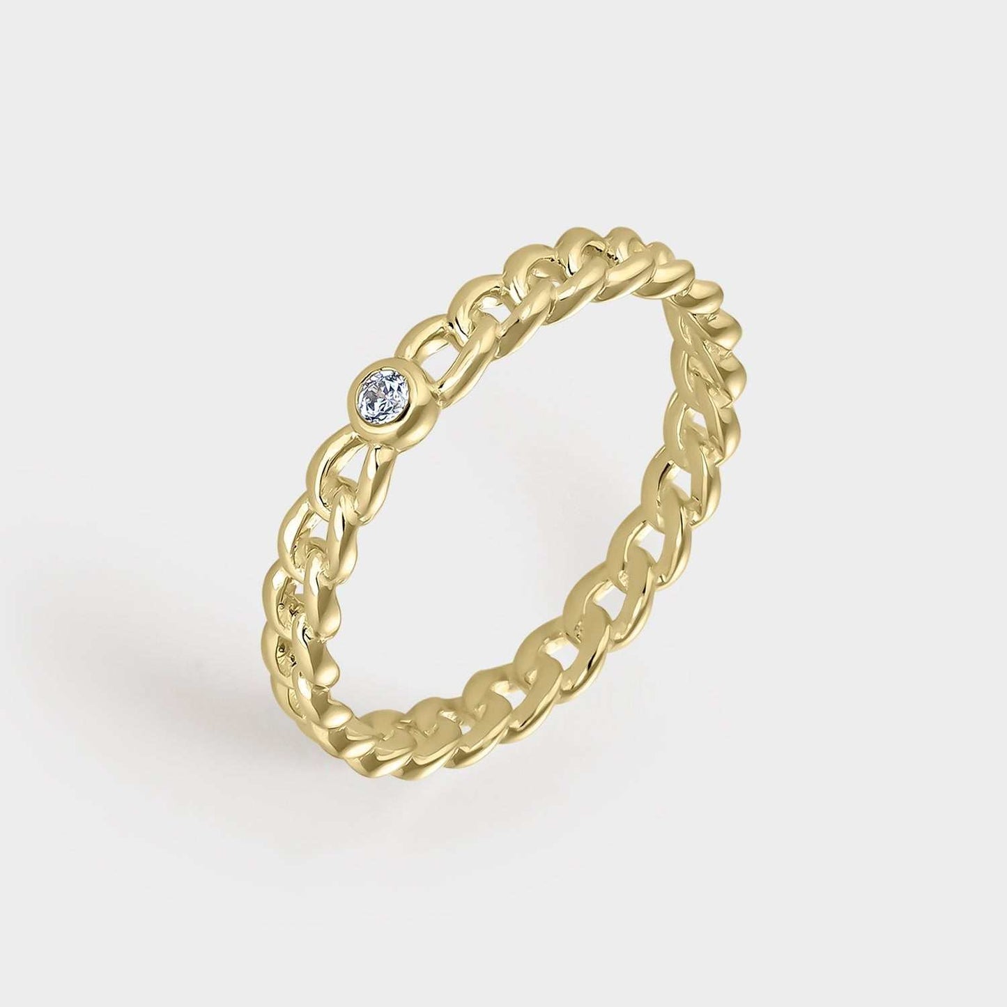 Yellow gold-plated silver ring with round links intertwined with white zirconia set in bezel